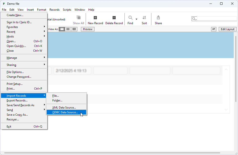 An opened file in FileMaker Pro with the extended File menu and Import Records submenu