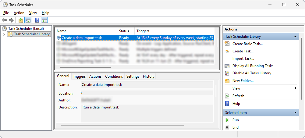 The created task appears in Task Scheduler Library