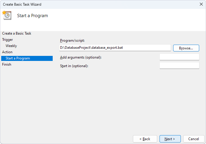 Select the .bat file on the Start a Program page of the Create Basic Task Wizard
